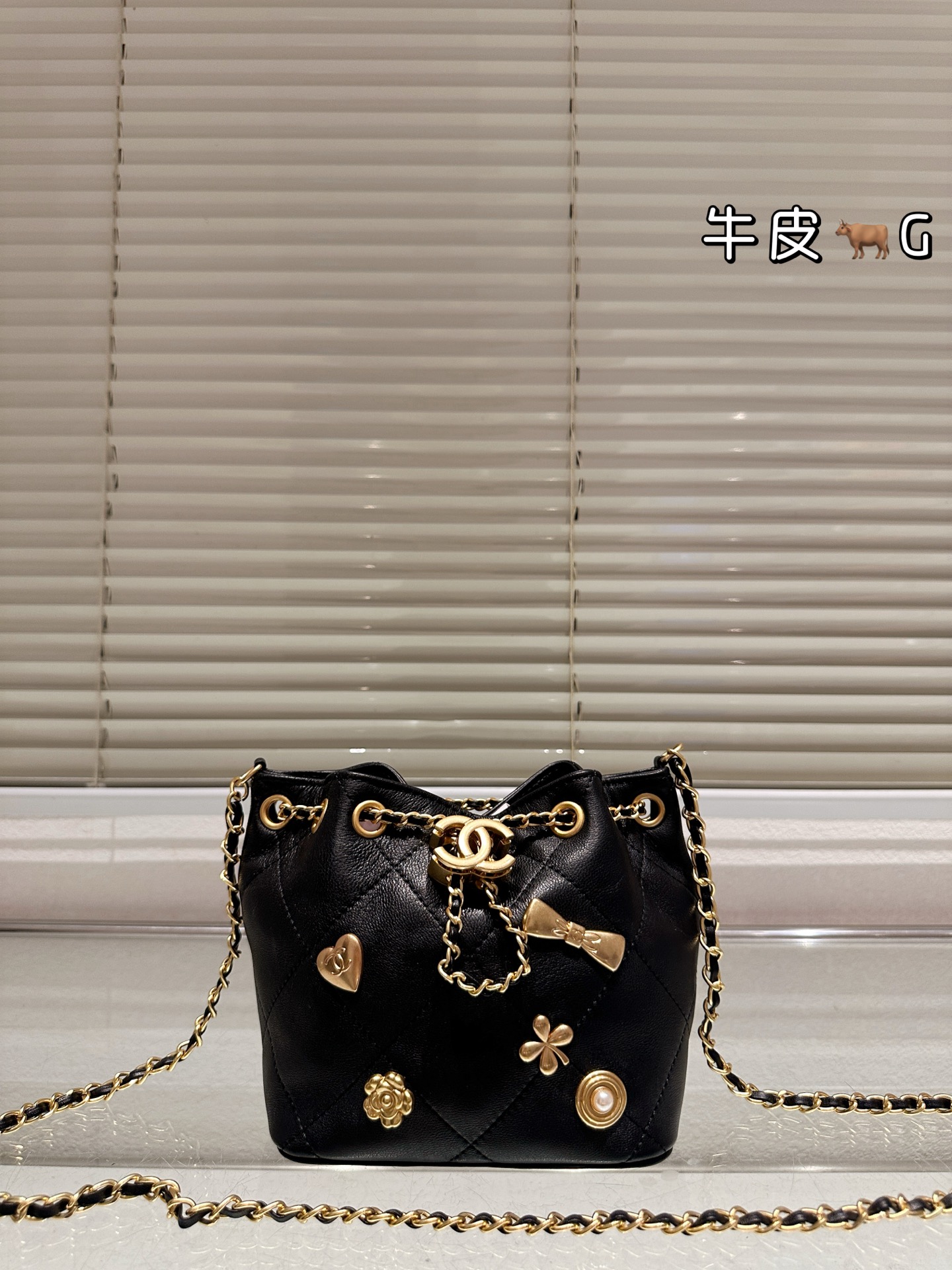 Chanel 25K Black Gold Drawstring Bucket Bag