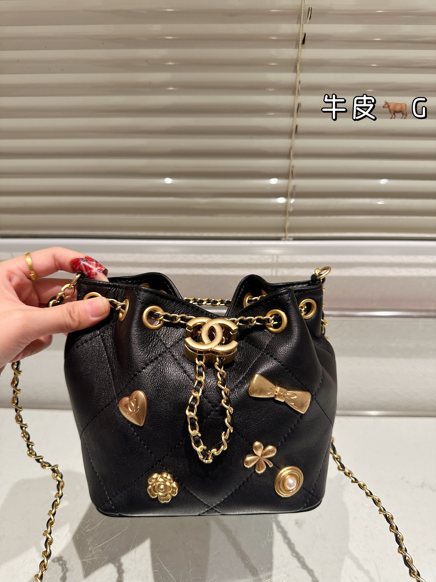 Chanel 25K Black Gold Drawstring Bucket Bag