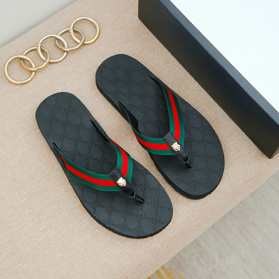 Classic stripes g pattern flip flops