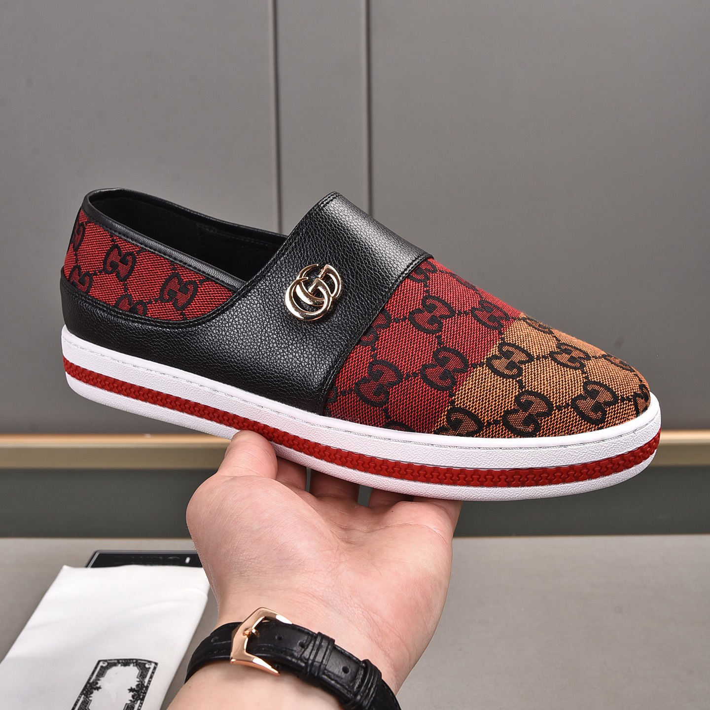 low-top rubber-soled branded-print slip-ons