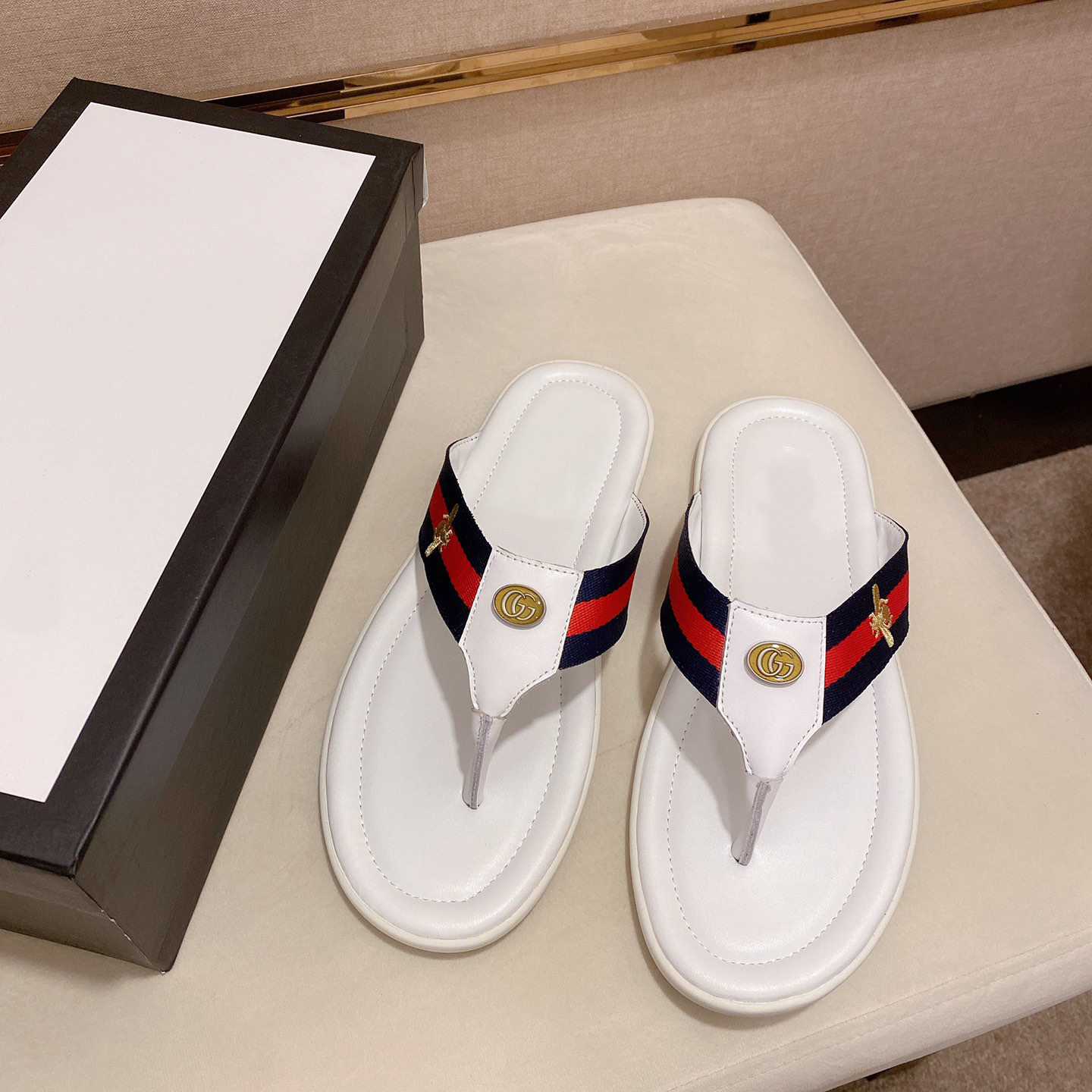Leather brand flip flops