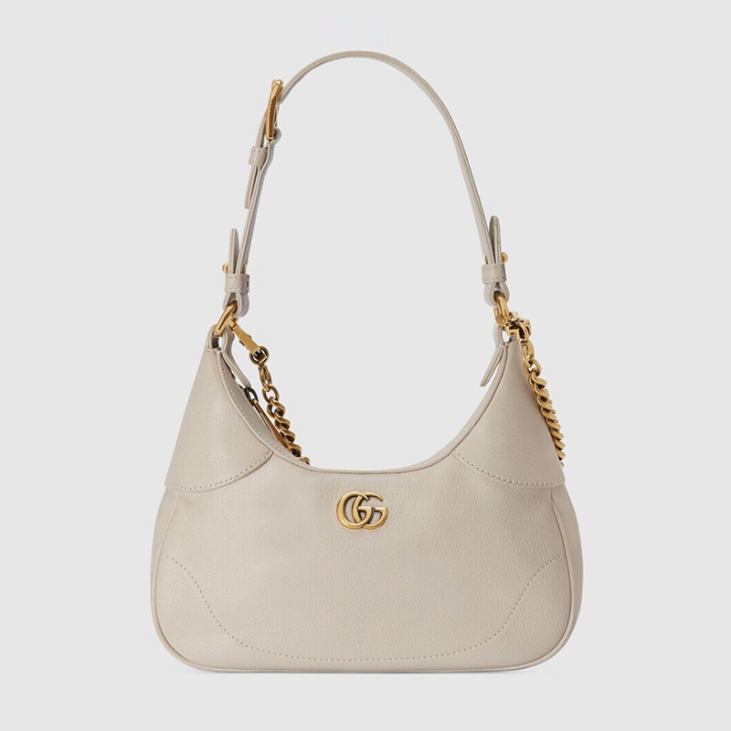 Chain-embellished textured-leather shoulder bag