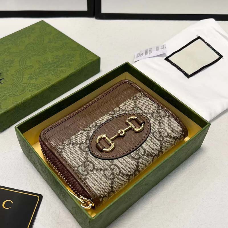 A lady's brown leather card bag or coin purse