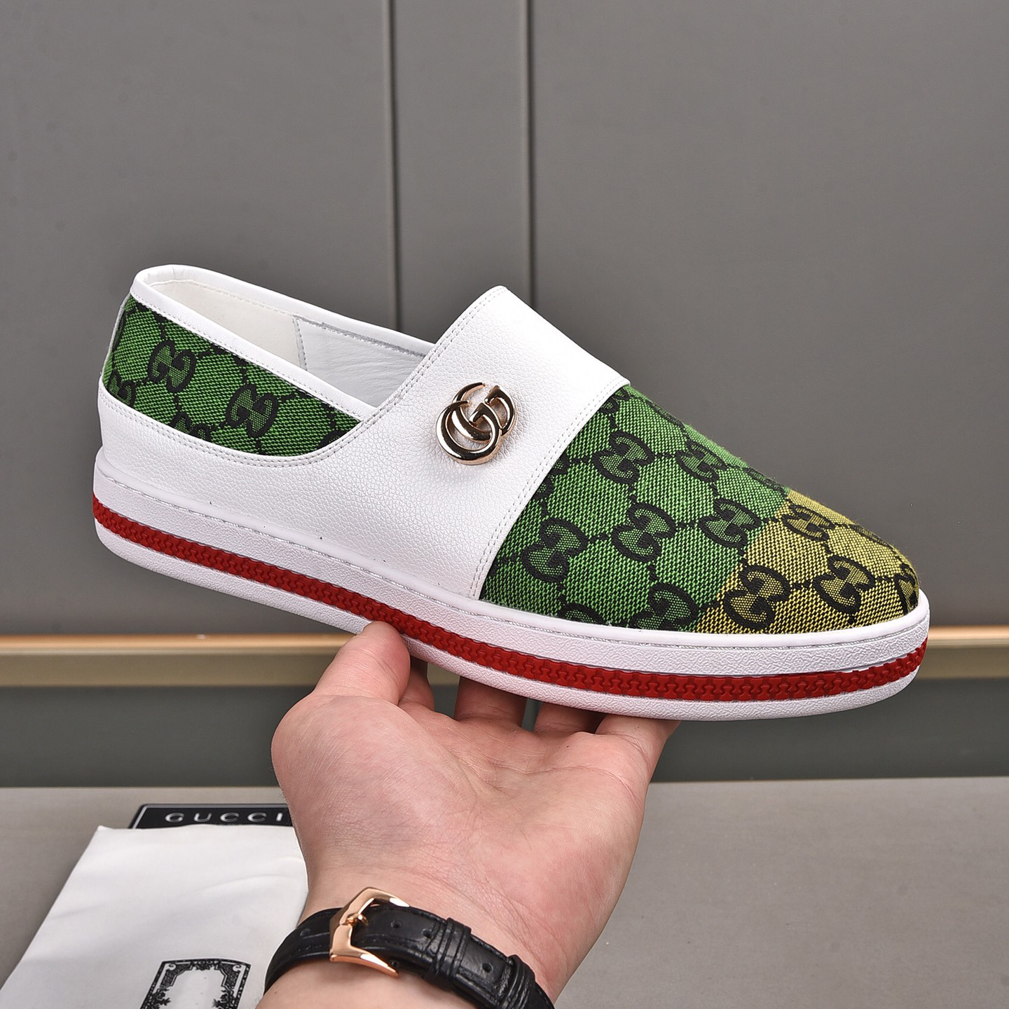 low-top rubber-soled branded-print slip-ons