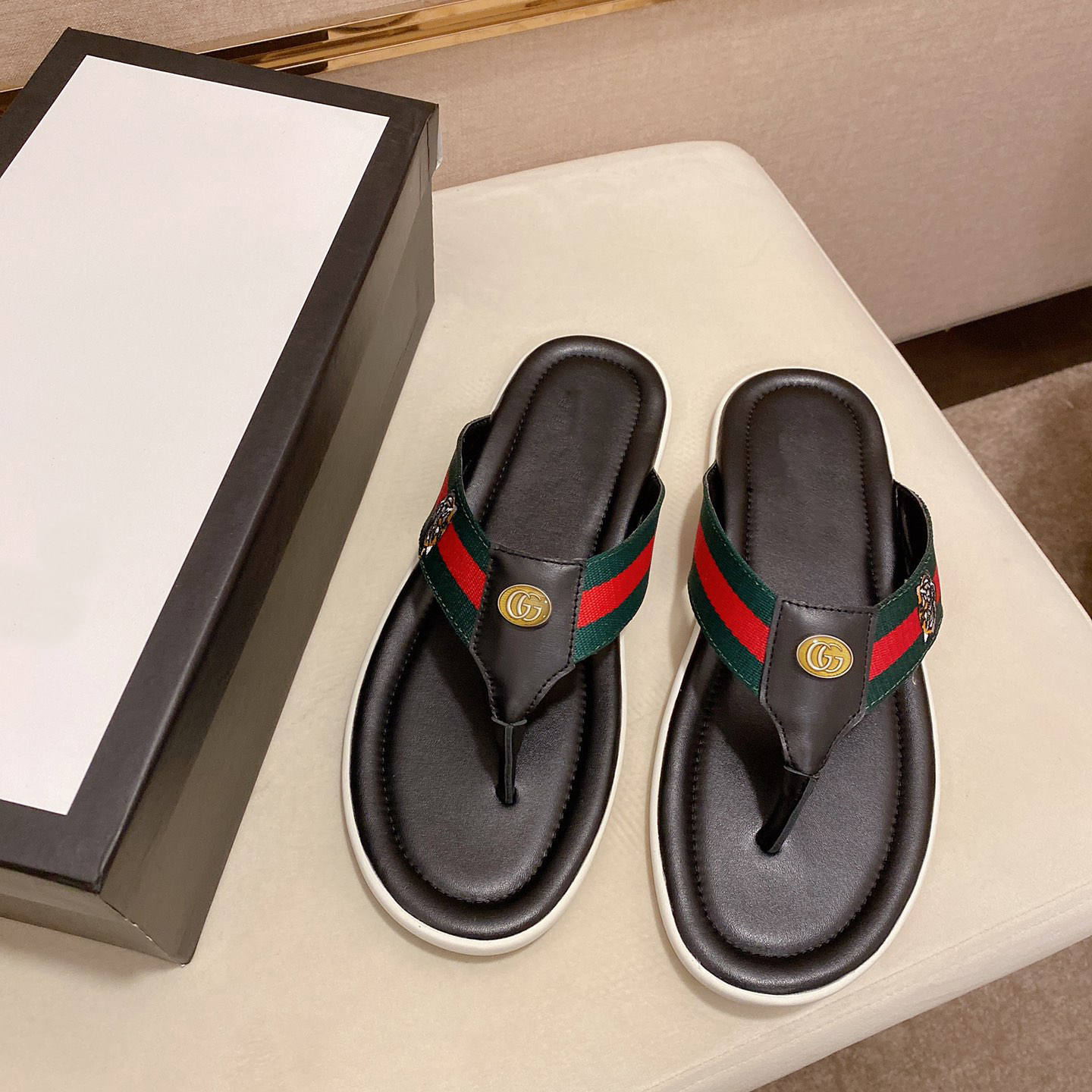 Leather brand flip flops