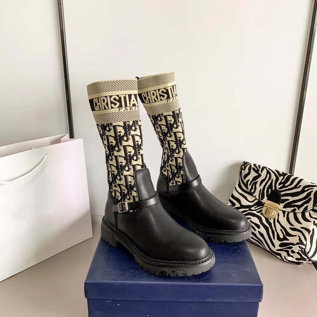 Mid-leg flat Doc Martens, elasticized boots with letters