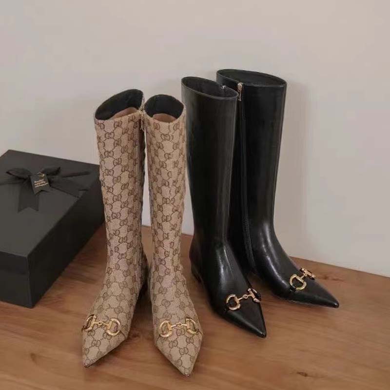 Vintage thigh-high boots with pointed toes