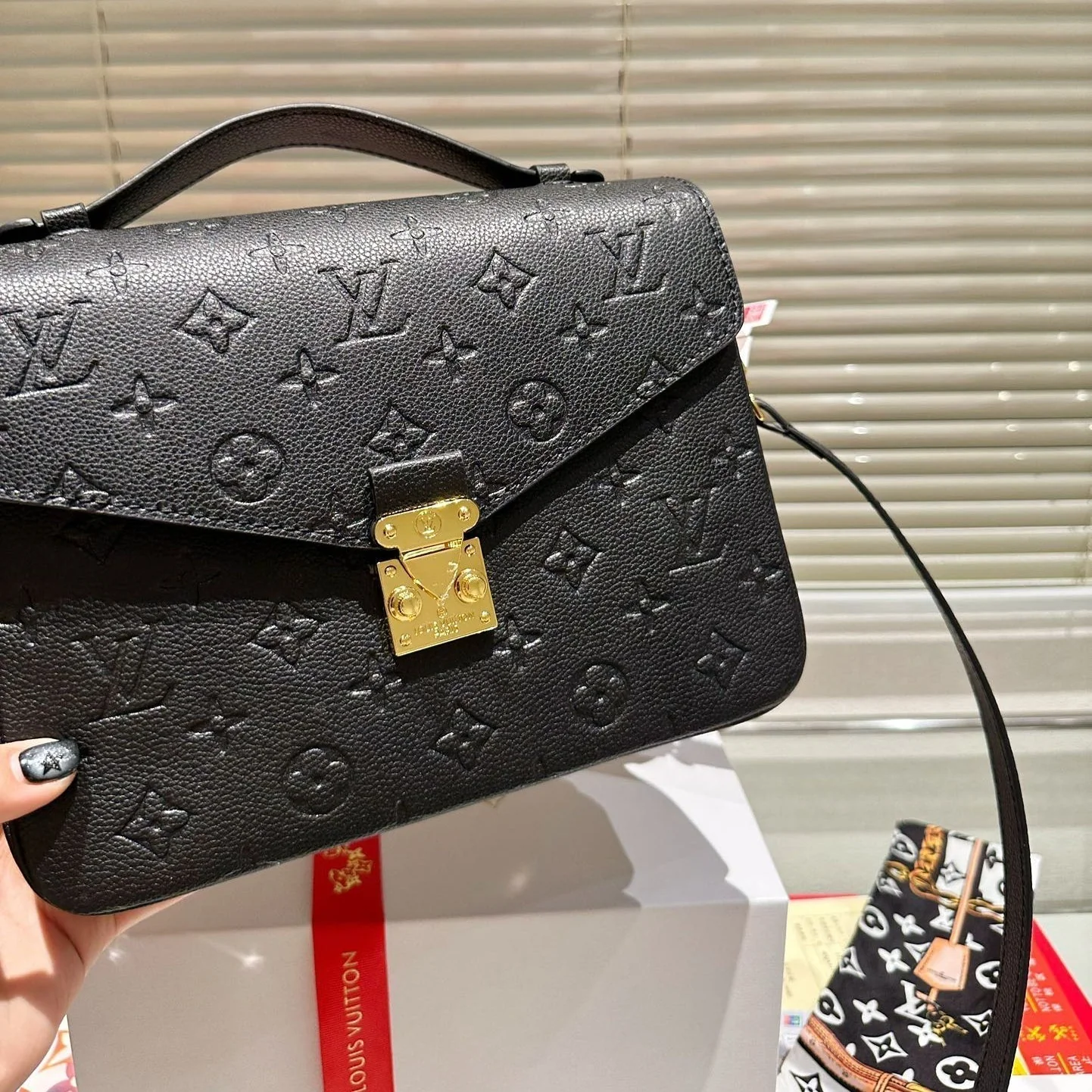 Stylish embossed messenger bag