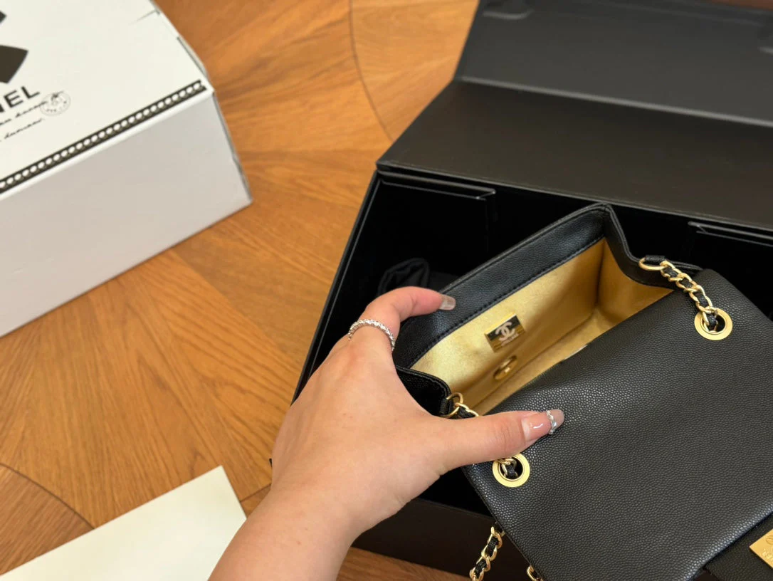 Fashionable caviar metal ball square bag