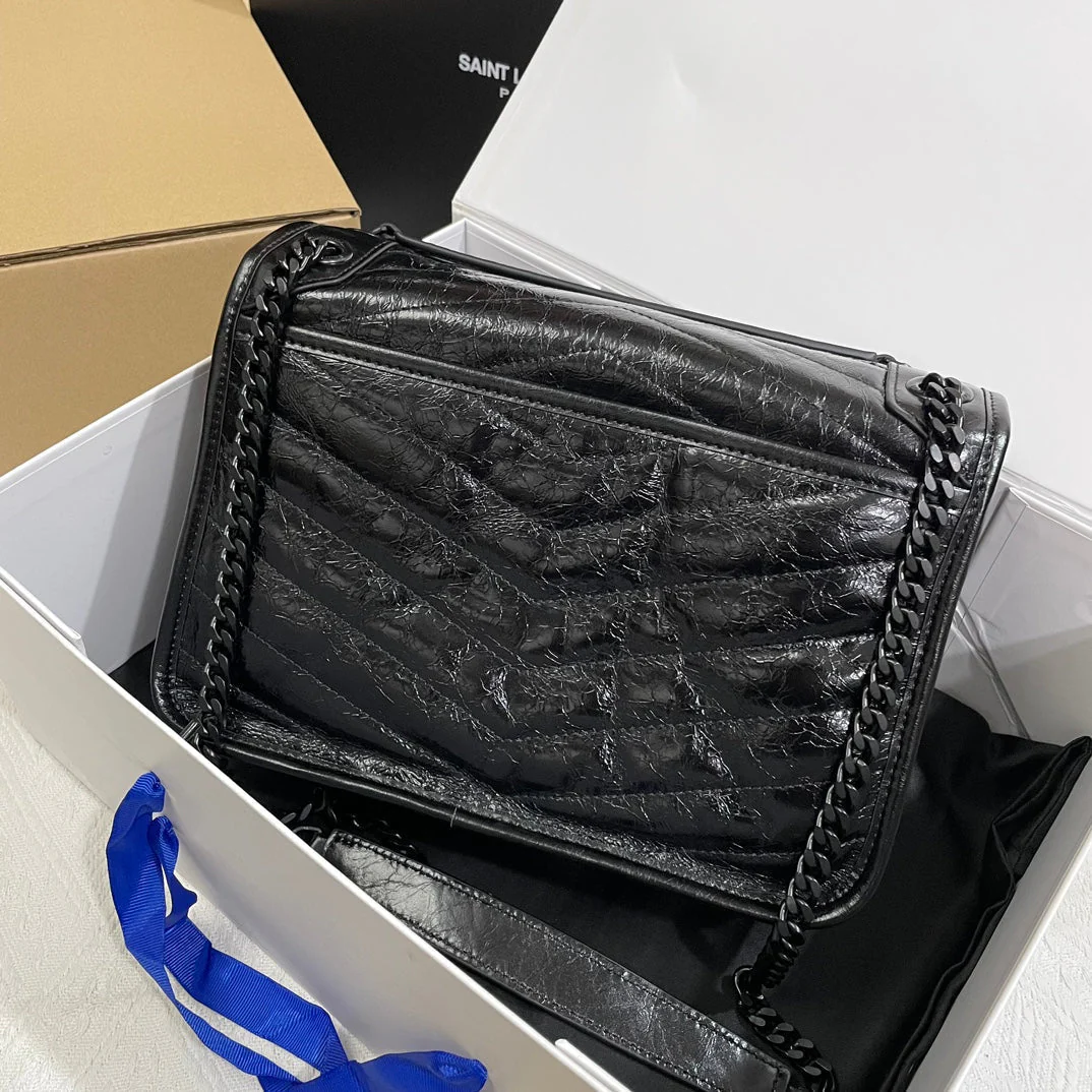 New waxed leather with gold buckle messenger bag