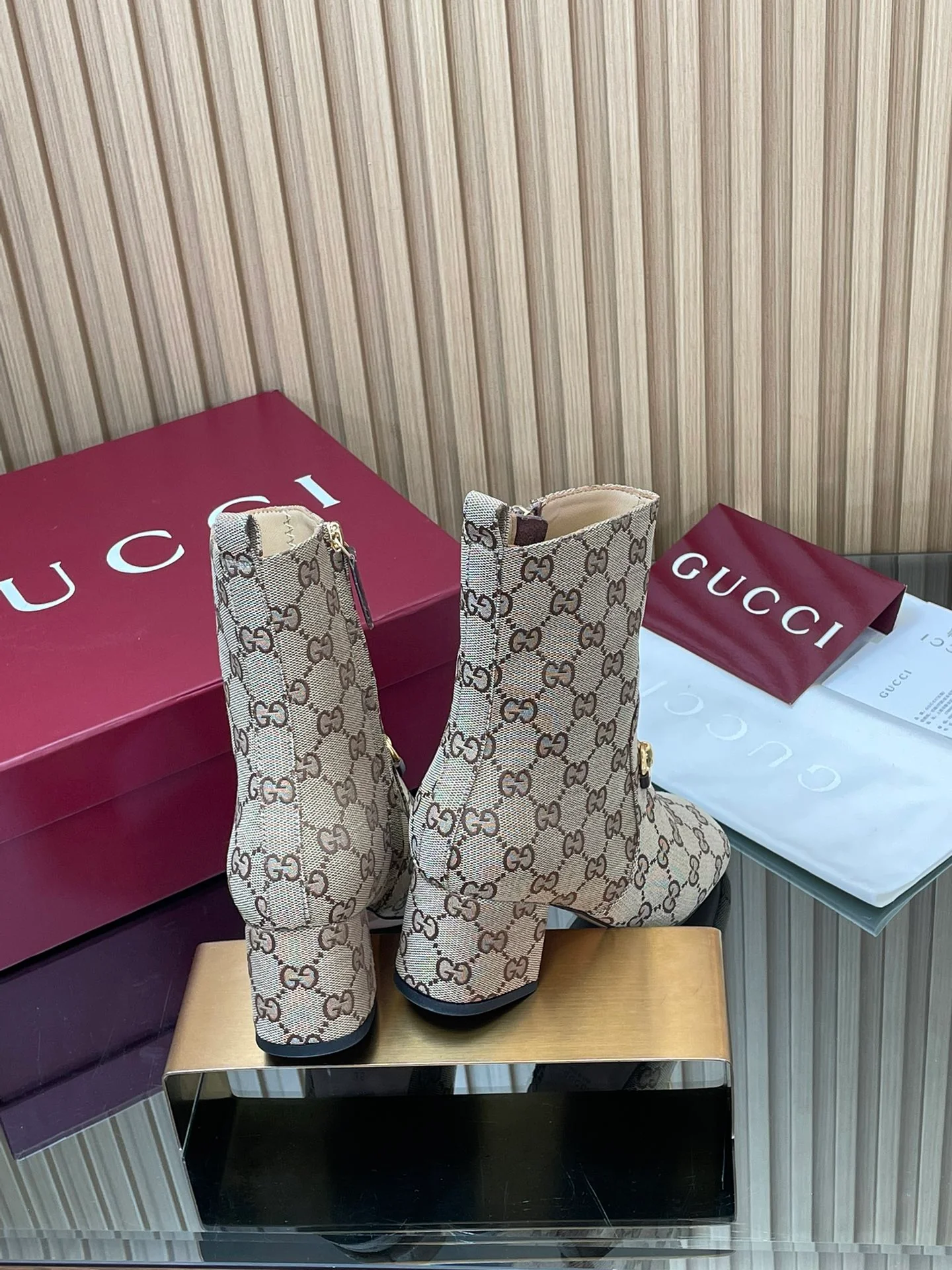 Horsebit monogrammed fabric block heel square toe ankle boots. Heel height: 5.5cm