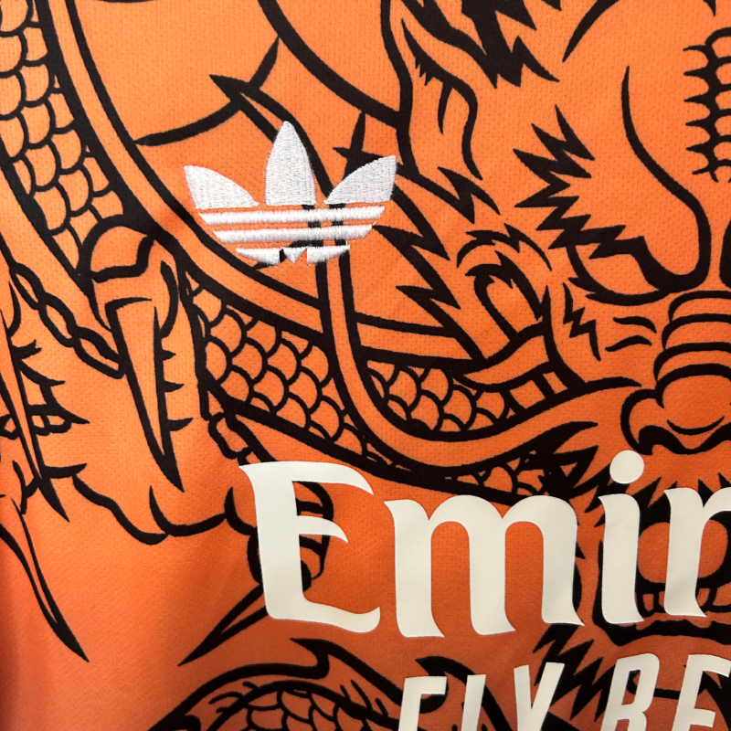 2025/2026 Real Madrid Dragon Orange Fan Edition Football Shirt