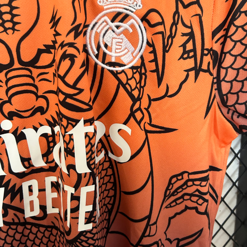 2025/2026 Real Madrid Dragon Orange Fan Edition Football Shirt
