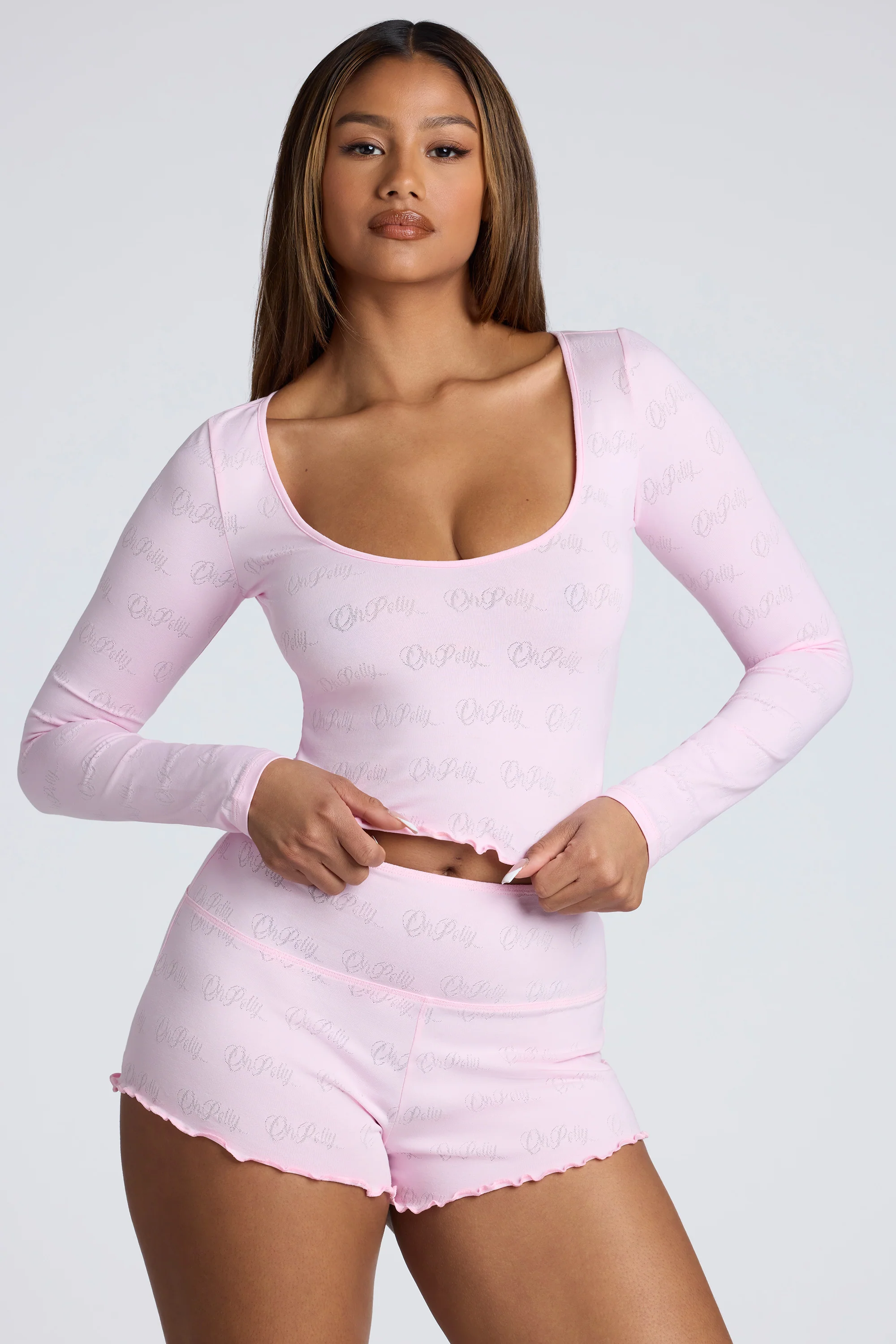 Long Sleeve Scoop Neck Pointelle Crop Top in Baby Pink
