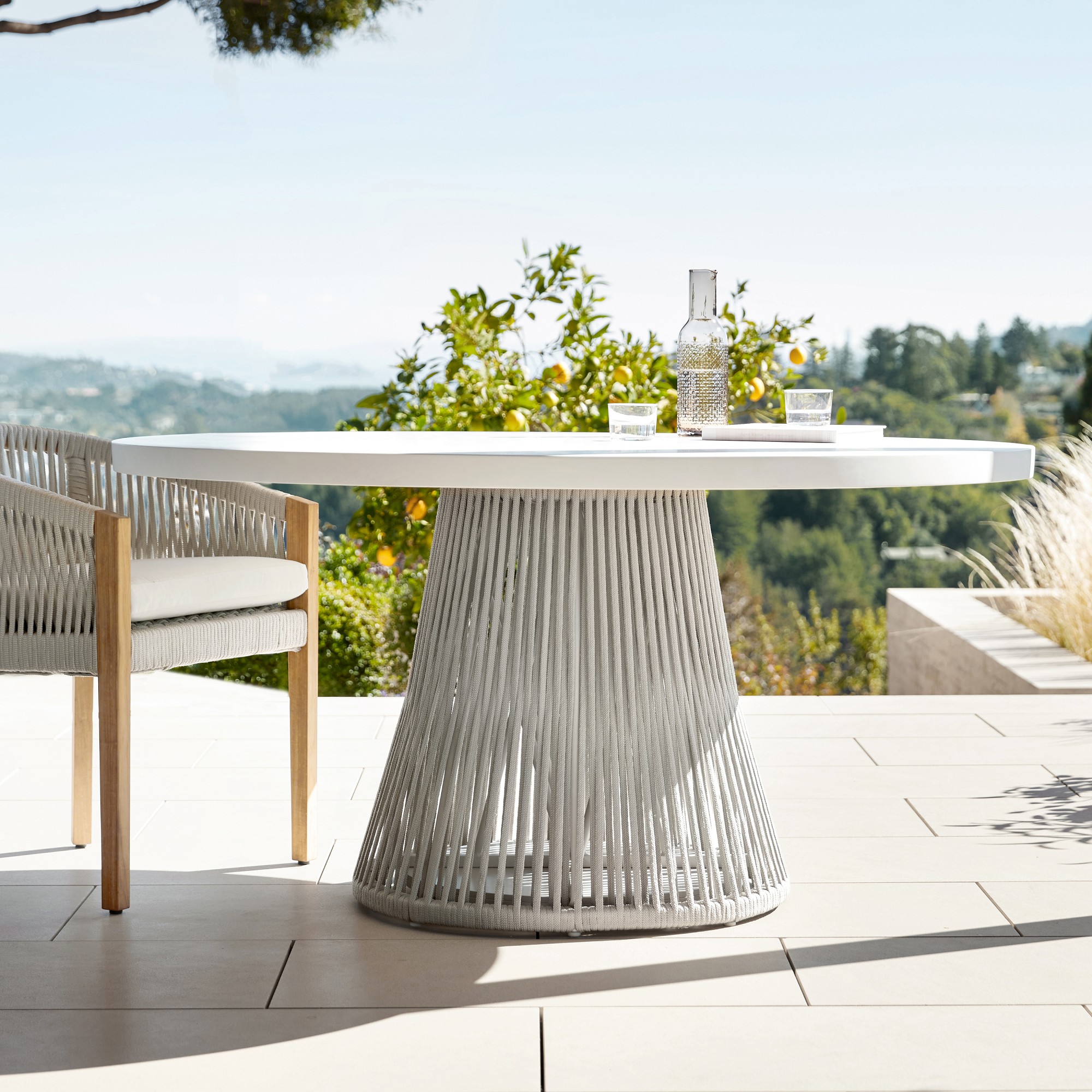 Pasadena Outdoor Fiberstone and Rope Round Dining Table & Pasadena Dining Chairs (60)