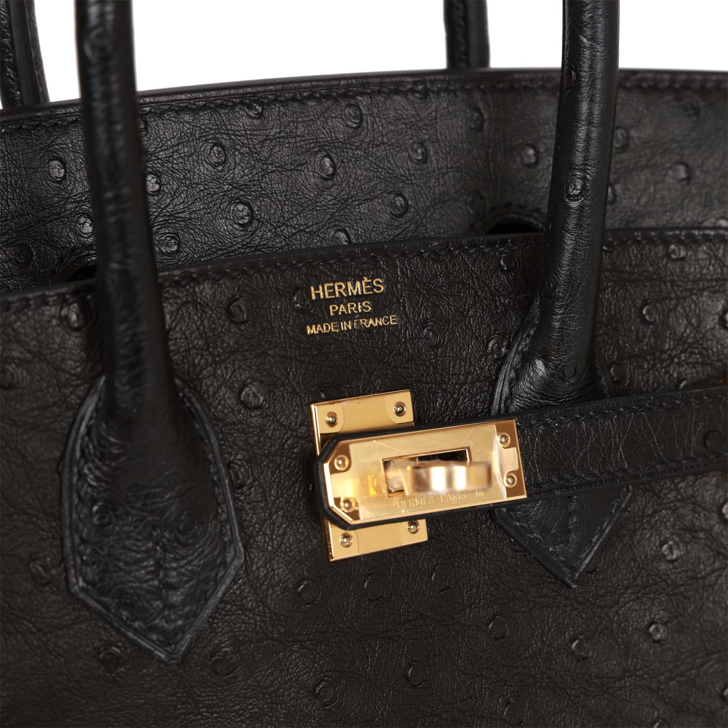 Her Birkin 25 Black Ostrich Gold Hardware