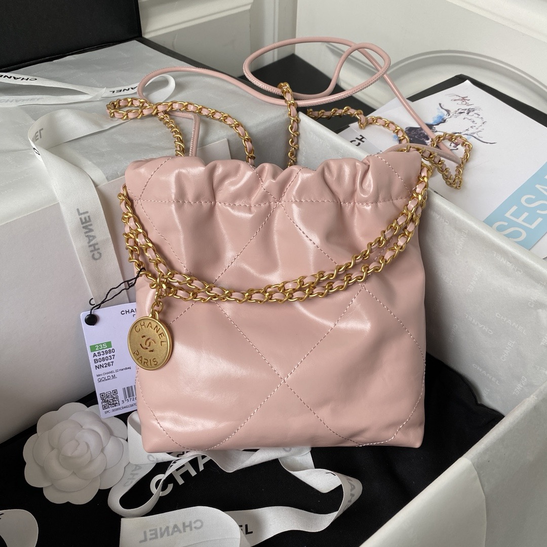 CHANEL CHANEL 22 Mini Handbag Shiny Calfskin & Gold-Tone Metal Light Pink- AS3980