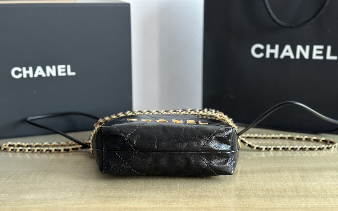 CHANEL CHANEL 22 Mini Handbag Shiny Calfskin & Gold-Tone Metal Black- AS3980