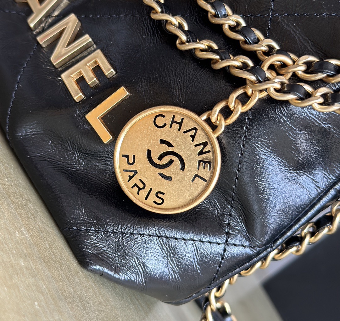 CHANEL CHANEL 22 Mini Handbag Shiny Calfskin & Gold-Tone Metal Black- AS3980