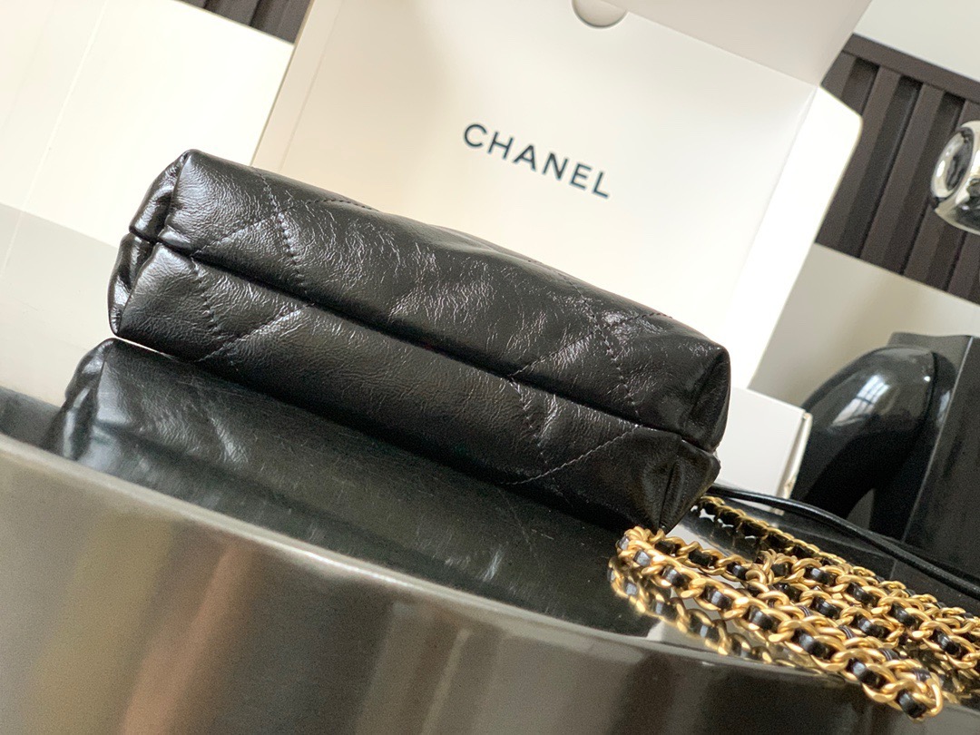 CHANEL CHANEL 22 Mini Handbag Shiny Calfskin, Imitation Pearls & Gold-Tone Metal Black- AS3980