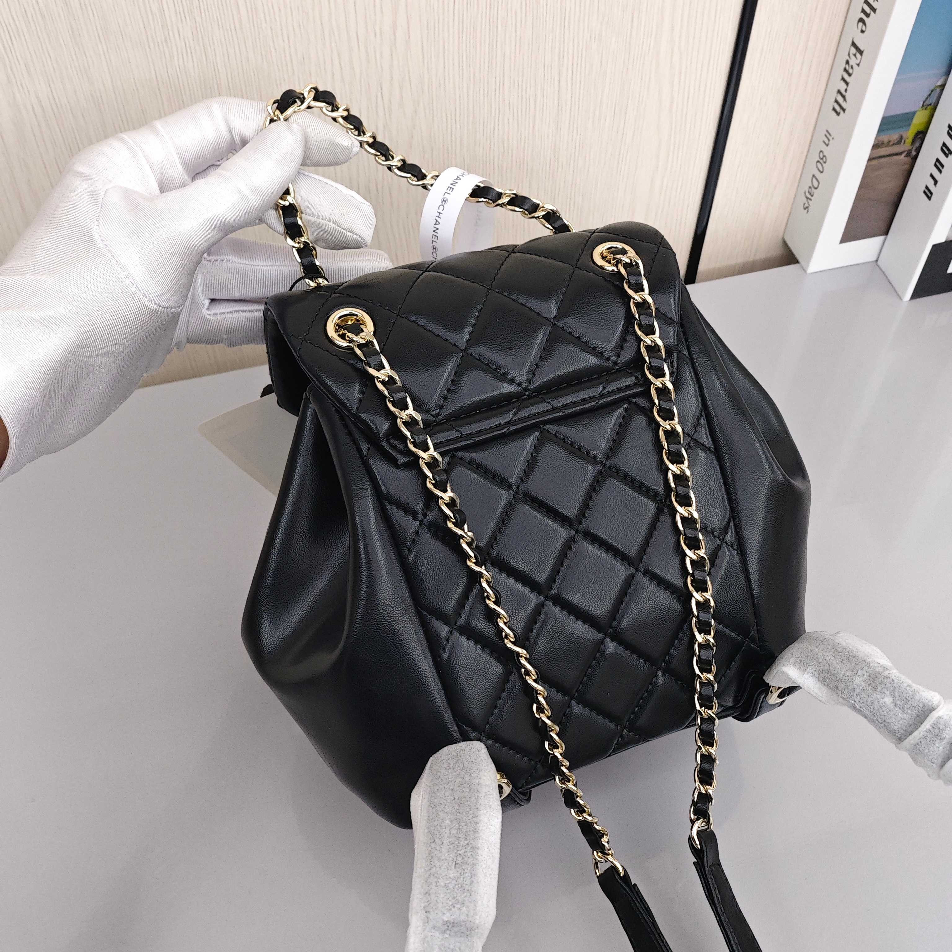 CHANEL Duma Backpack/Dual - Strap Bag with Gold - Tone Hardware, Quilted Flap, in Small Size, Made of Calfskin Leather, Black, for Women