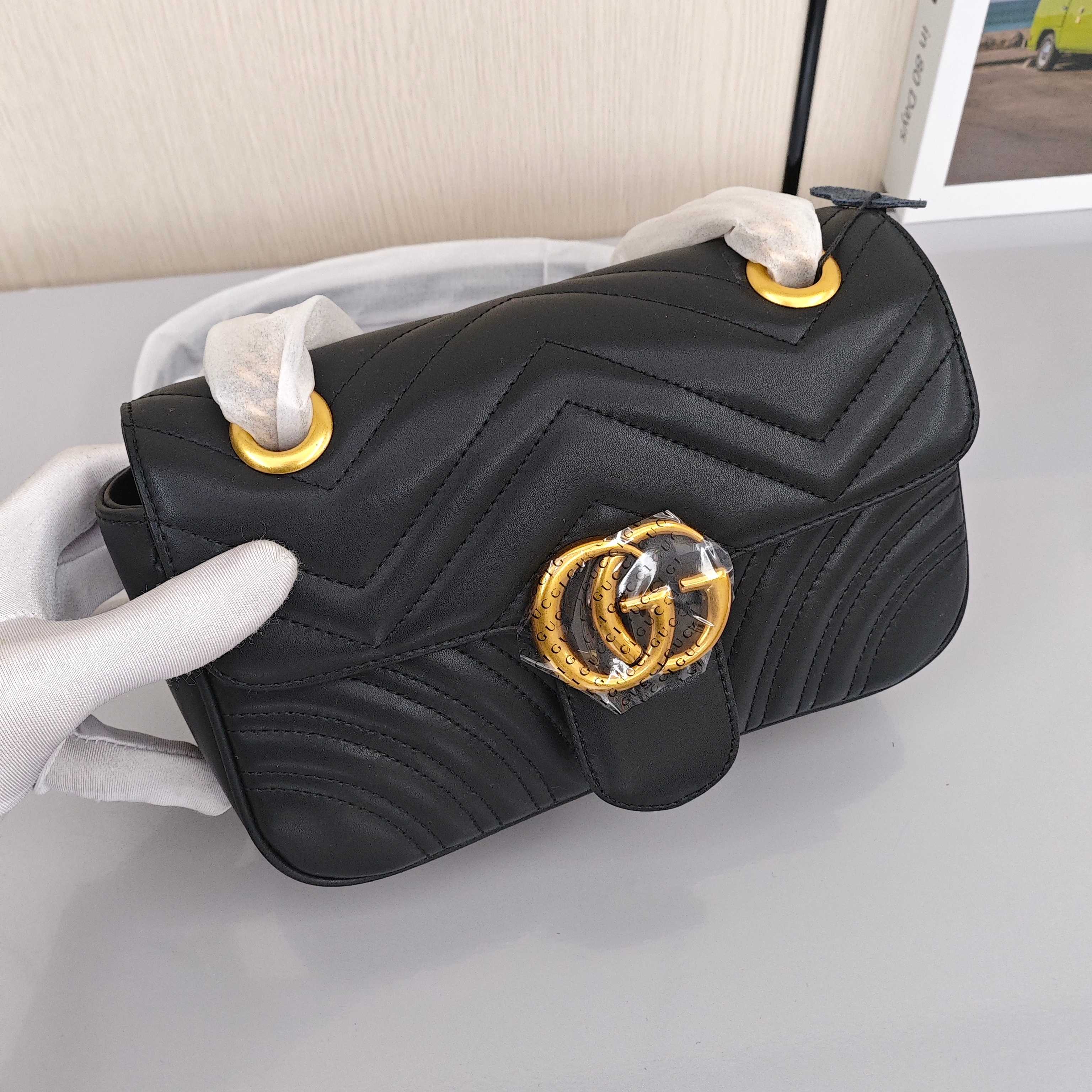 GUCCI GG Marmont Women's Crossbody/Shoulder Bag with Gold - tone Logo in Distressed Finish, Black