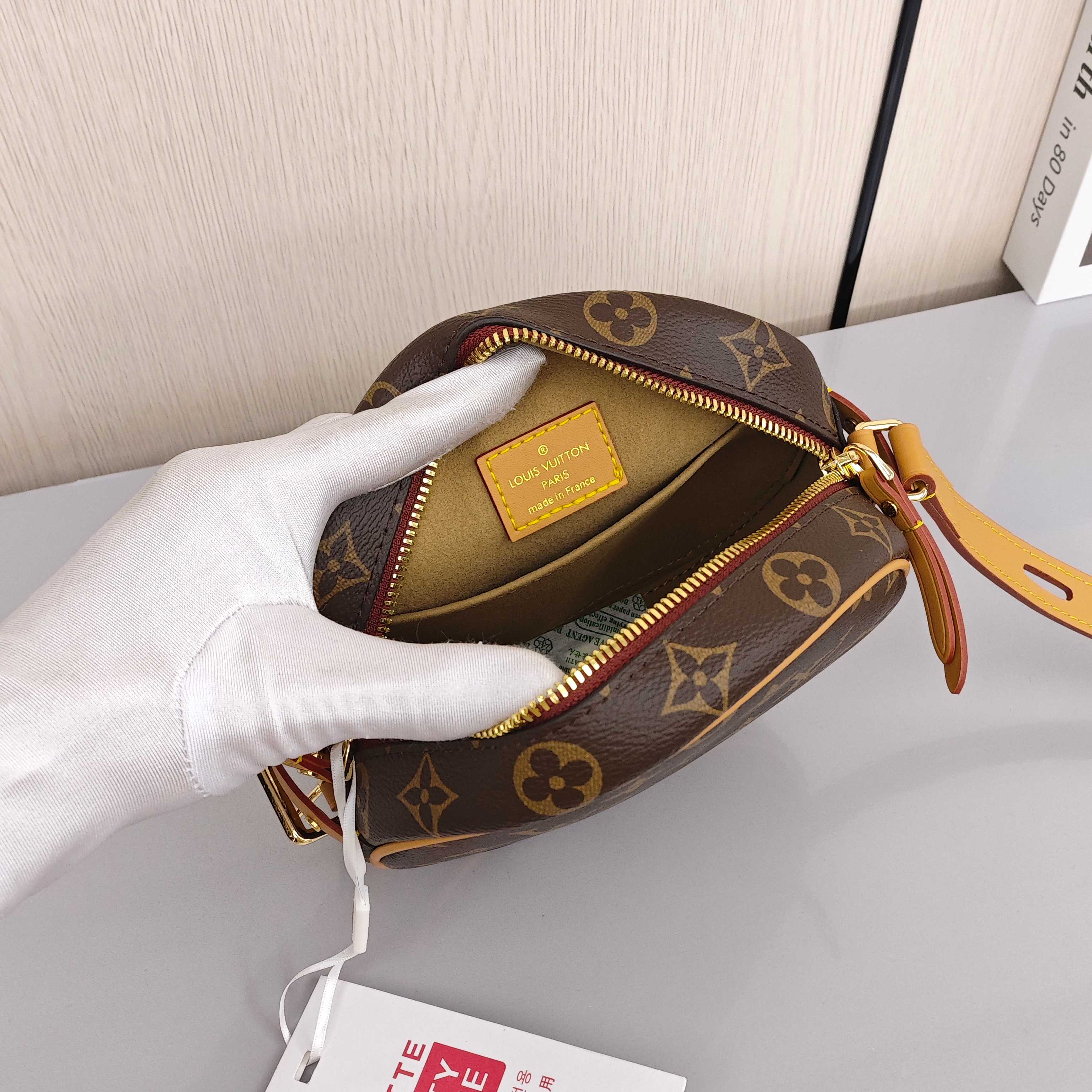 LOUIS VUITTON Boite Chapeau Souple PM Small - sized Women's Shoulder/Crossbody Bag with Monogram Canvas All - Over Print and Zipper Closure, Brown