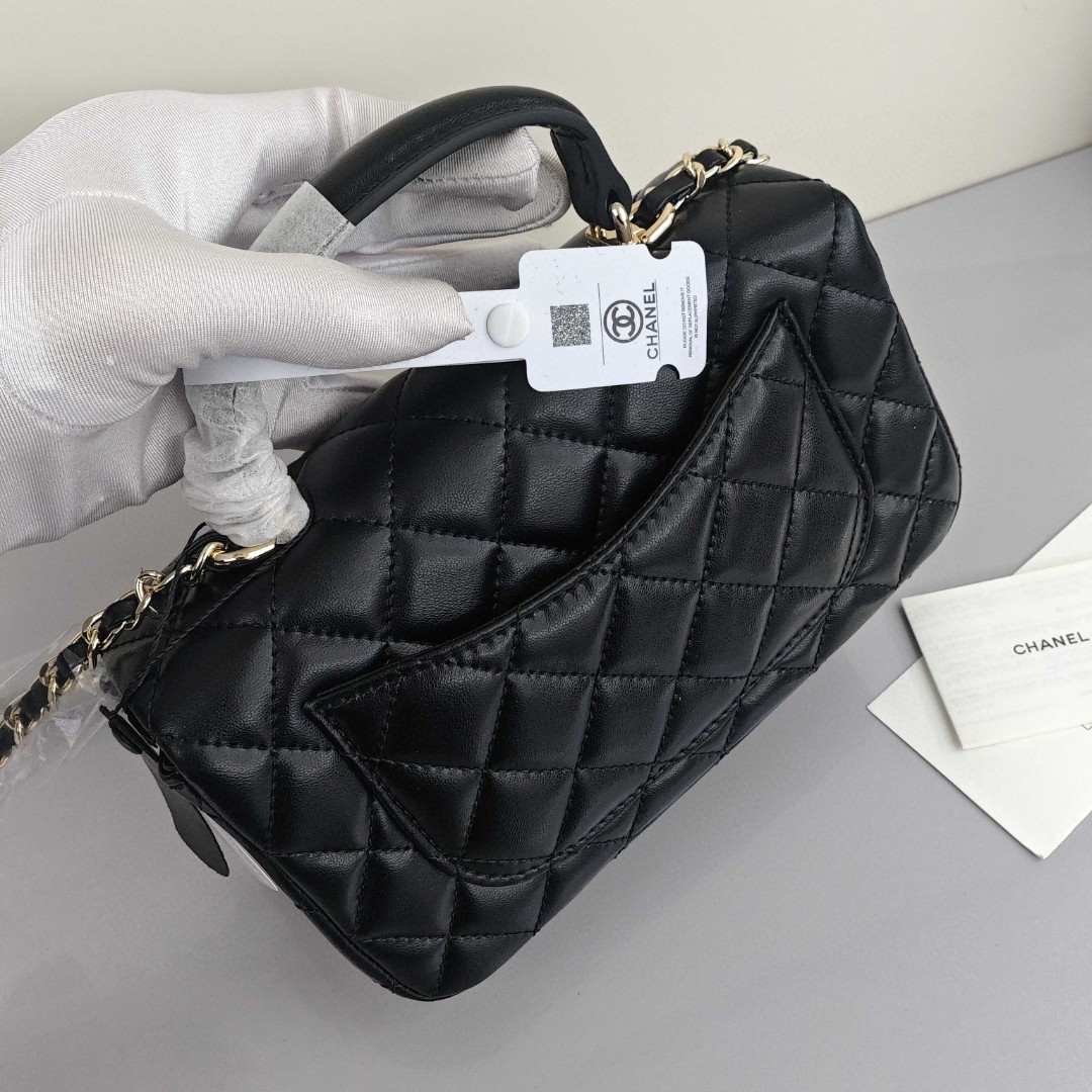 CHANEL Classic Flap CF Mini Handbag with Glossy Gold - Tone Hardware. Made of lambskin leather, it's a flap - over bag that can be carried as a handbag, shoulder bag or crossbody bag. Mini size, for women, black.