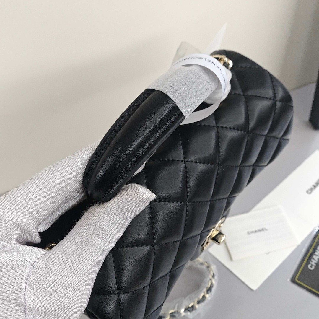 CHANEL Classic Flap CF Mini Handbag with Glossy Gold - Tone Hardware. Made of lambskin leather, it's a flap - over bag that can be carried as a handbag, shoulder bag or crossbody bag. Mini size, for women, black.