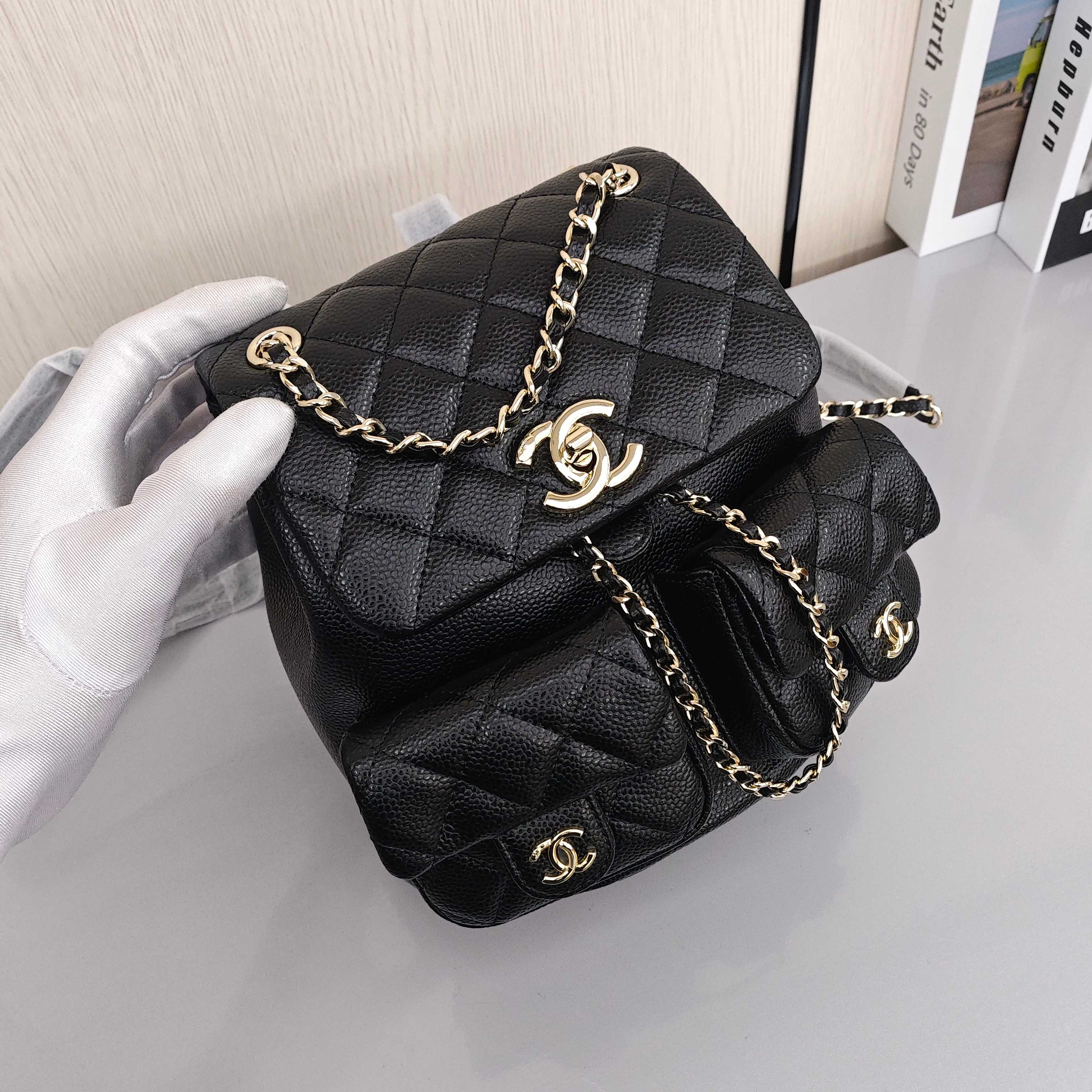 CHANEL Duma 24A Retro Backpack/Dual - Strap Bag with Light Gold - Tone Hardware and Quilted Pattern, Made of Grained Calfskin Leather, Medium Size, Unisex, Black