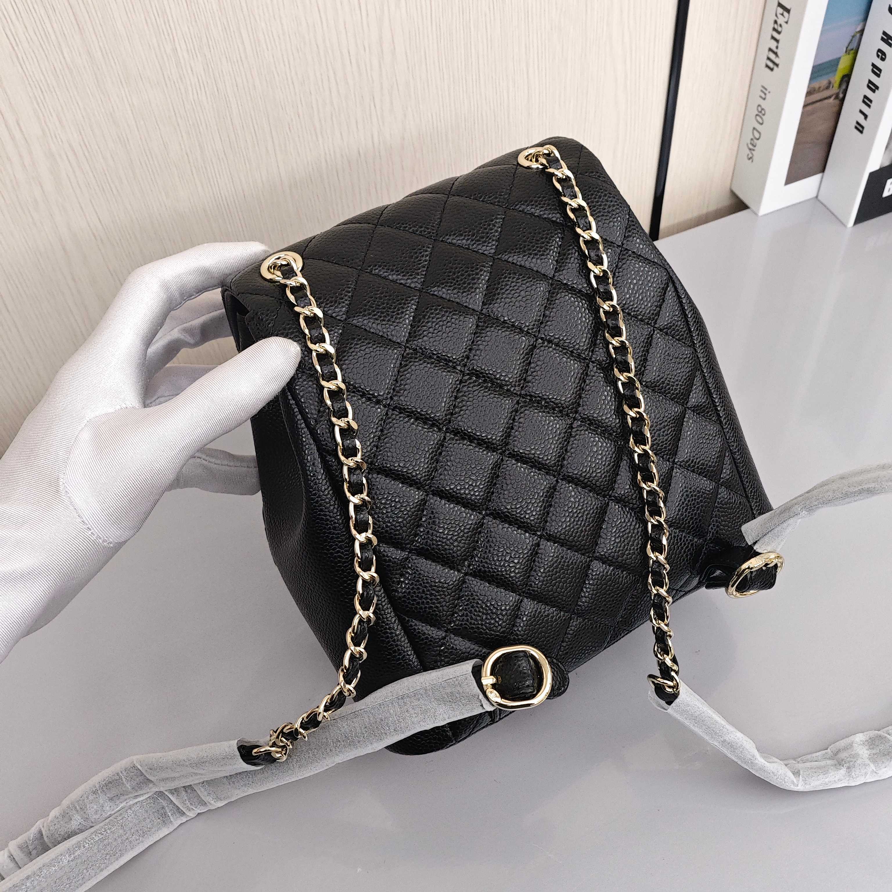 CHANEL Duma 24A Retro Backpack/Dual - Strap Bag with Light Gold - Tone Hardware and Quilted Pattern, Made of Grained Calfskin Leather, Medium Size, Unisex, Black