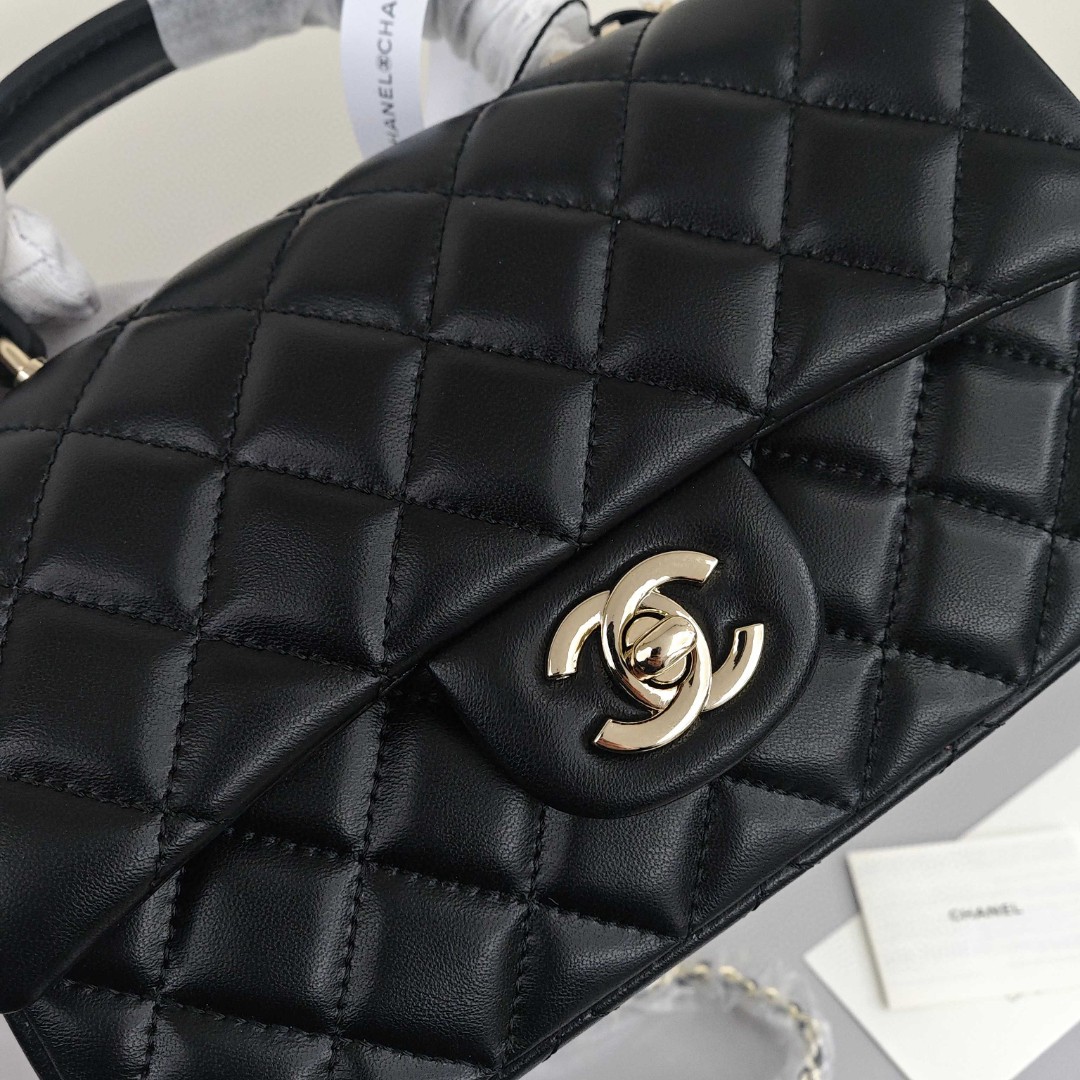 CHANEL Classic Flap CF Mini Handbag with Glossy Gold - Tone Hardware. Made of lambskin leather, it's a flap - over bag that can be carried as a handbag, shoulder bag or crossbody bag. Mini size, for women, black.