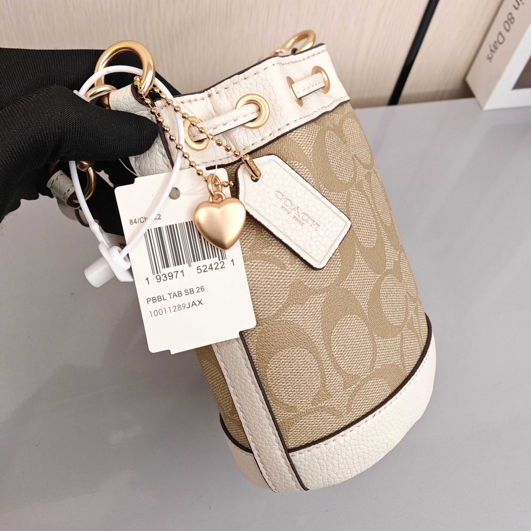 COACH Dempsey 15 Classic Monogram Canvas Coating with Cowhide Trim Bucket Bag, Handbag & Crossbody Bag, Mini Size, Women's Style, Light Khaki