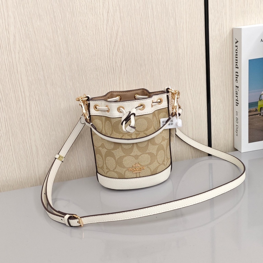 COACH Dempsey 15 Classic Monogram Canvas Coating with Cowhide Trim Bucket Bag, Handbag & Crossbody Bag, Mini Size, Women's Style, Light Khaki