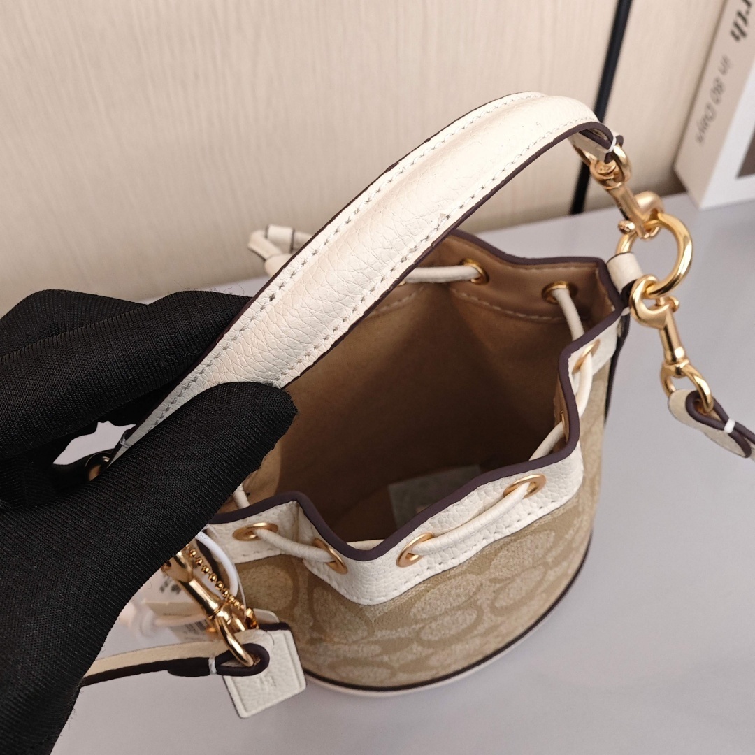 COACH Dempsey 15 Classic Monogram Canvas Coating with Cowhide Trim Bucket Bag, Handbag & Crossbody Bag, Mini Size, Women's Style, Light Khaki