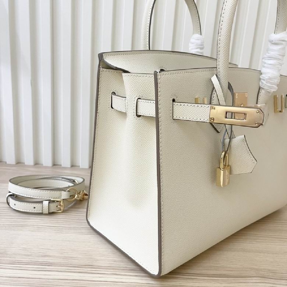 HERMES Birkin 30 with gold buckle, made of Togo leather, in Mushroom White color