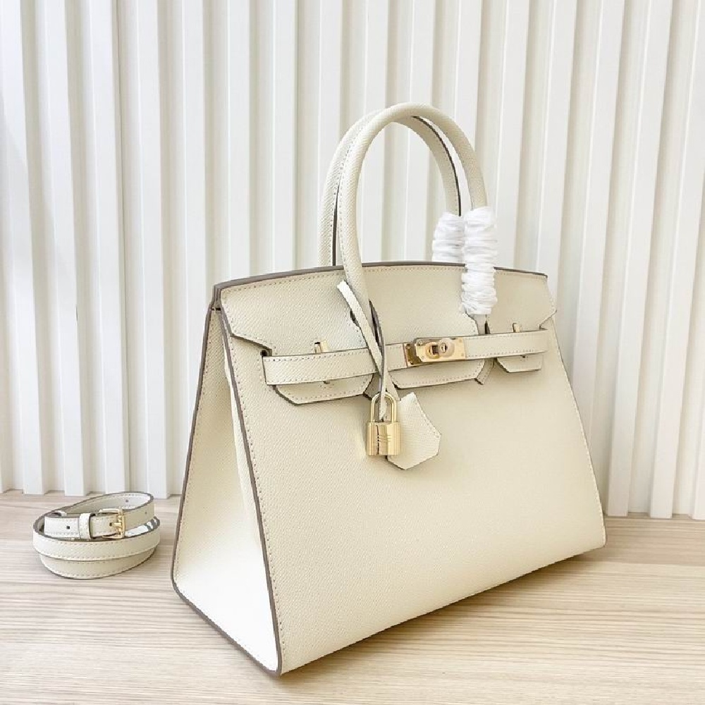 HERMES Birkin 30 with gold buckle, made of Togo leather, in Mushroom White color