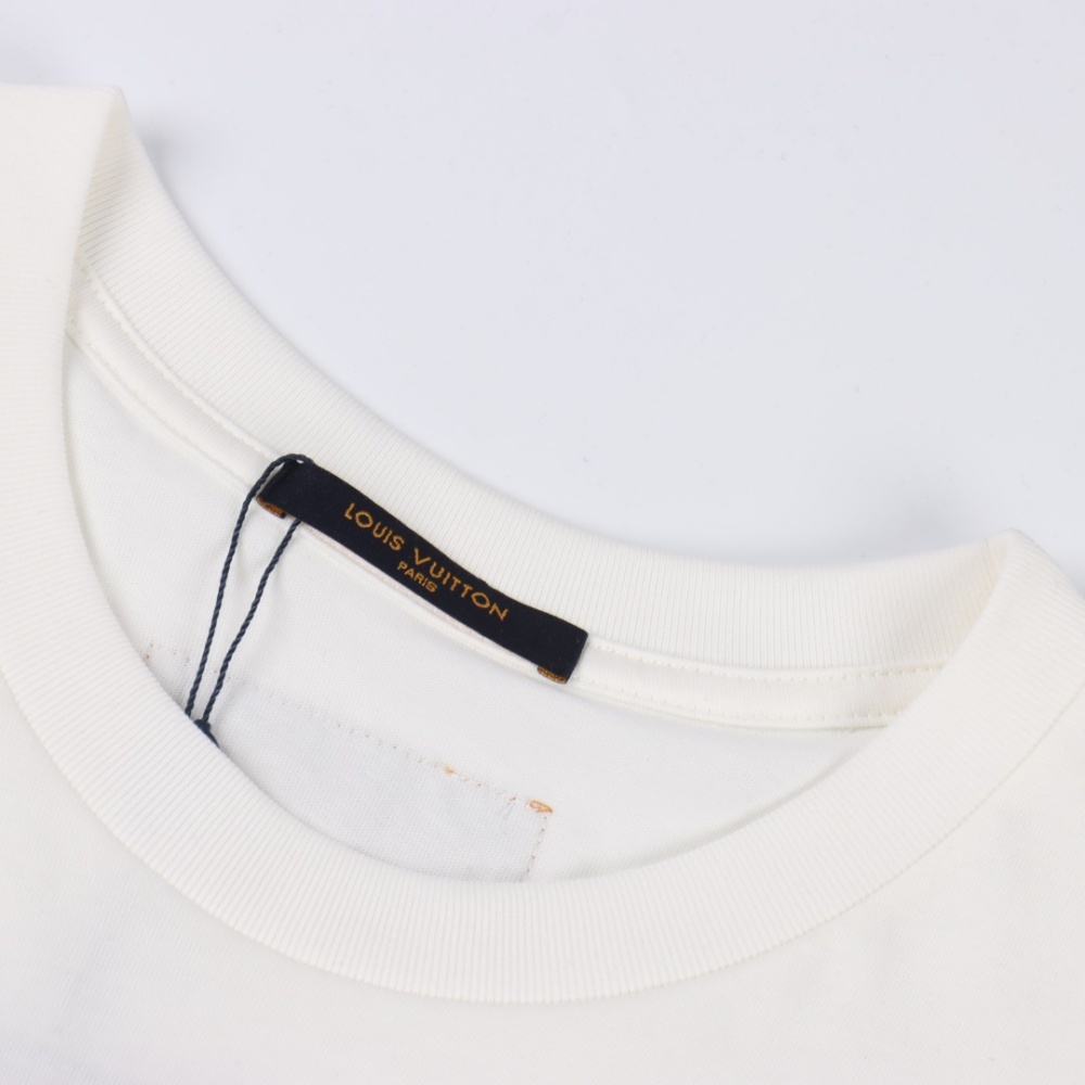 Louis Vuitton three - dimensional printed and embroidered short - sleeve top