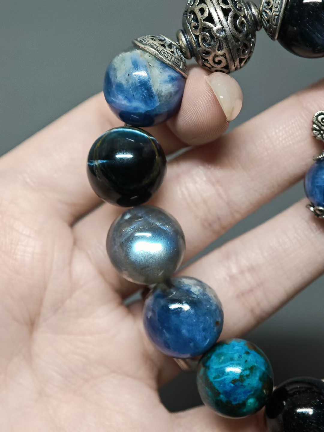 Waves kiss the sandy shore, stars sink to the sea floor.The night’s sea is moonlight shattered into salt.