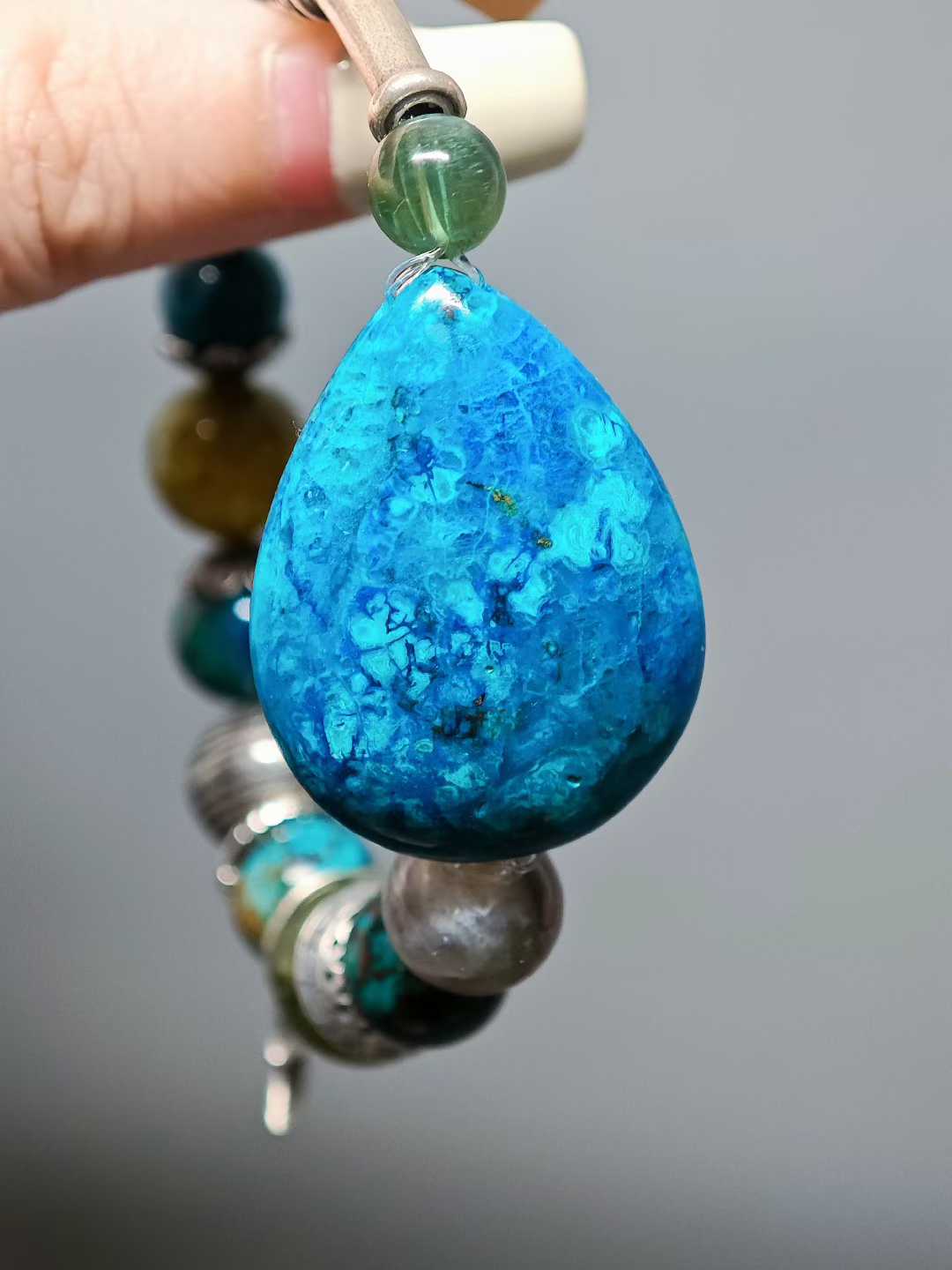 A handful of azure waves I hold, A thousand tastes of life hidden within. What I gather are but bubbles— Cast them aside, and there’s the azure again.