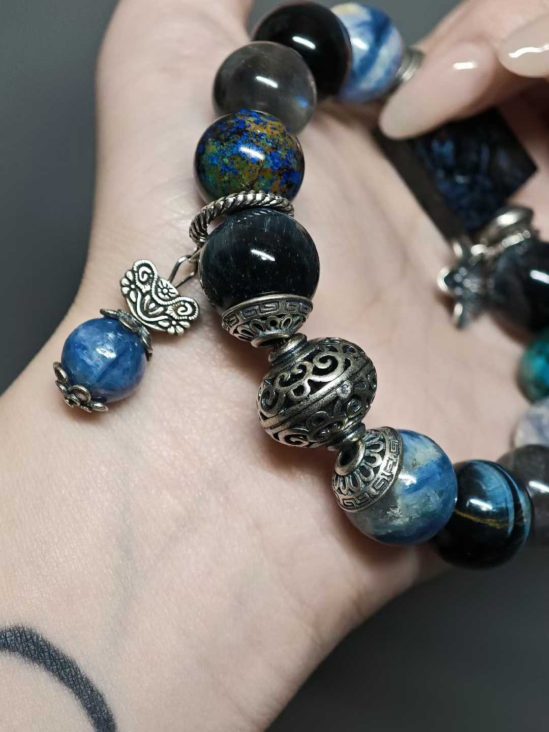 Waves kiss the sandy shore, stars sink to the sea floor.The night’s sea is moonlight shattered into salt.