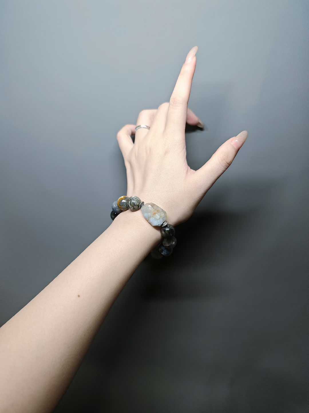 I sit and watch the clouds rise,My heart settles in this courtyard.