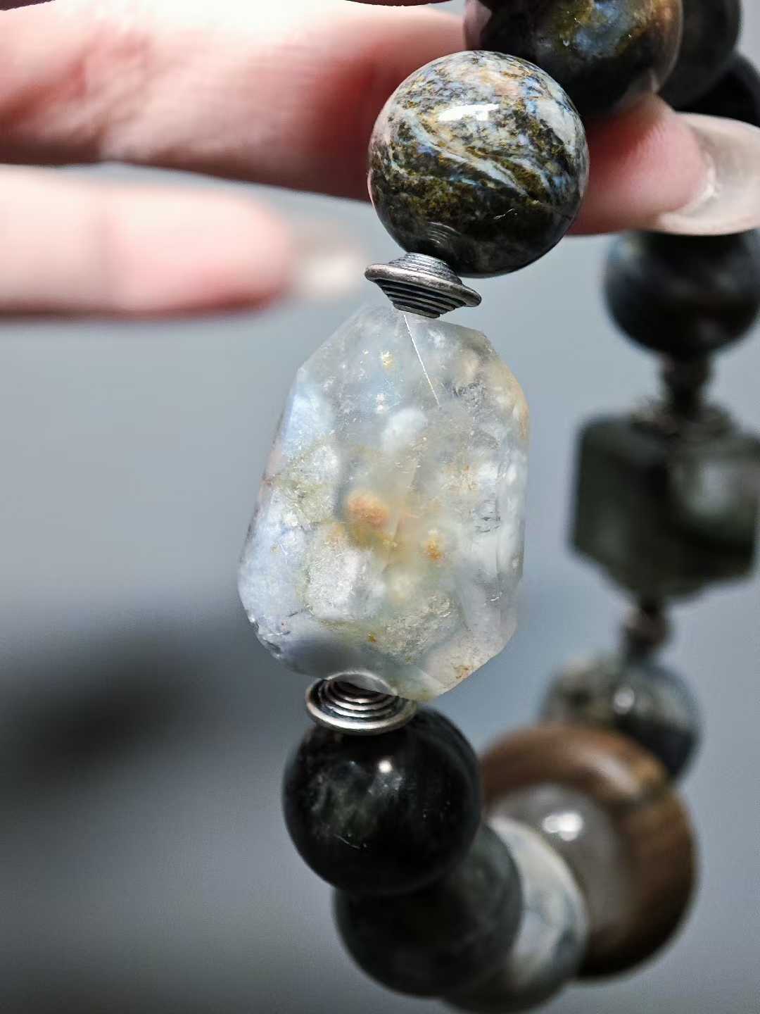 I sit and watch the clouds rise,My heart settles in this courtyard.