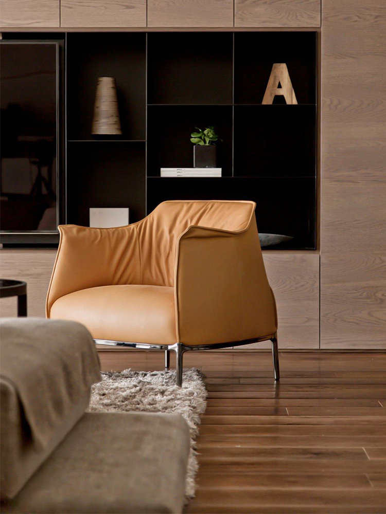 Italian minimalist Archibald single sofa chair, living room leather leisure chair, modern style balcony floor to ceiling reading chair.