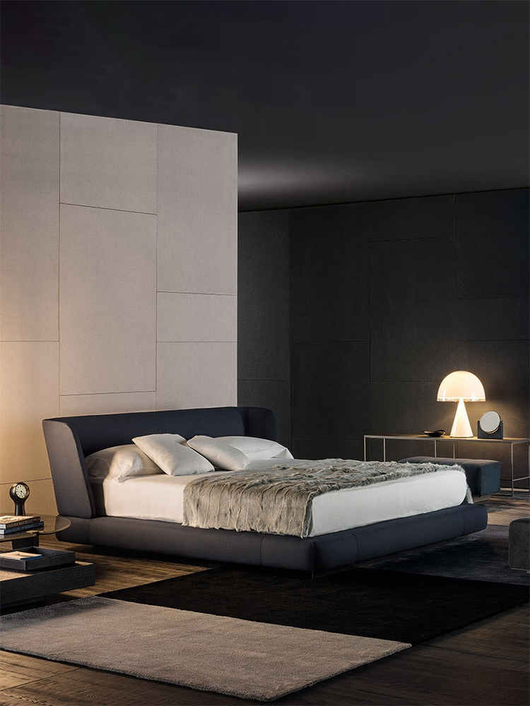 The Italian minimalist style Reeves bed is a modern semi-enclosed bed with high-quality fabric at the head. It is a double bed suitable for high-end bedrooms, villas, hotels, and apartments, featuring a first-layer cowhide bed frame.