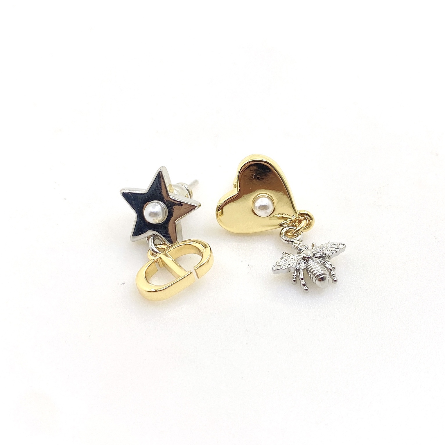 CD Two - toned heart - shaped five - pointed star asymmetrical earrings YV24060237
