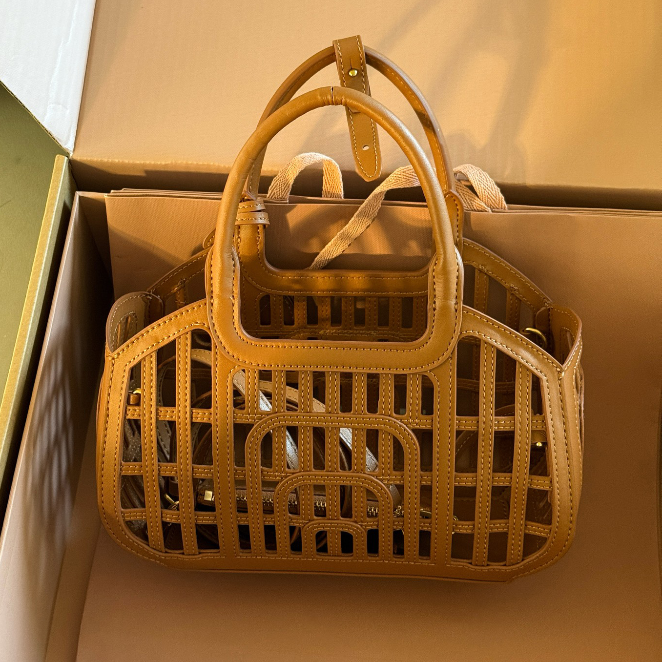 Miu Leather Woven Hollow Bag XX25082322