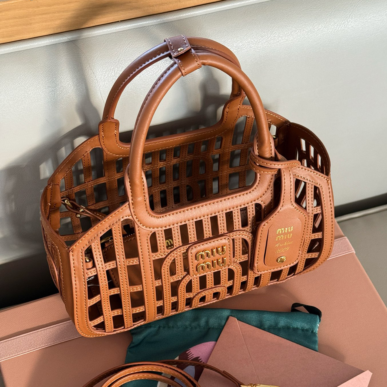 Miu Leather Woven Hollow Bag XX25082322