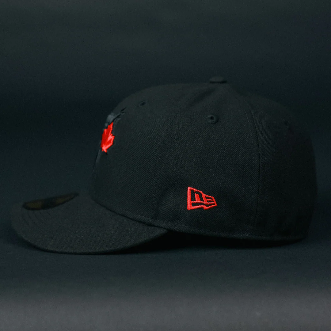 NEW ERA EXCLUSIVE 59FIFTY BLACKED OUT TORONTO BLUE JAYS W/ 40TH SEASON SIDE PATCH