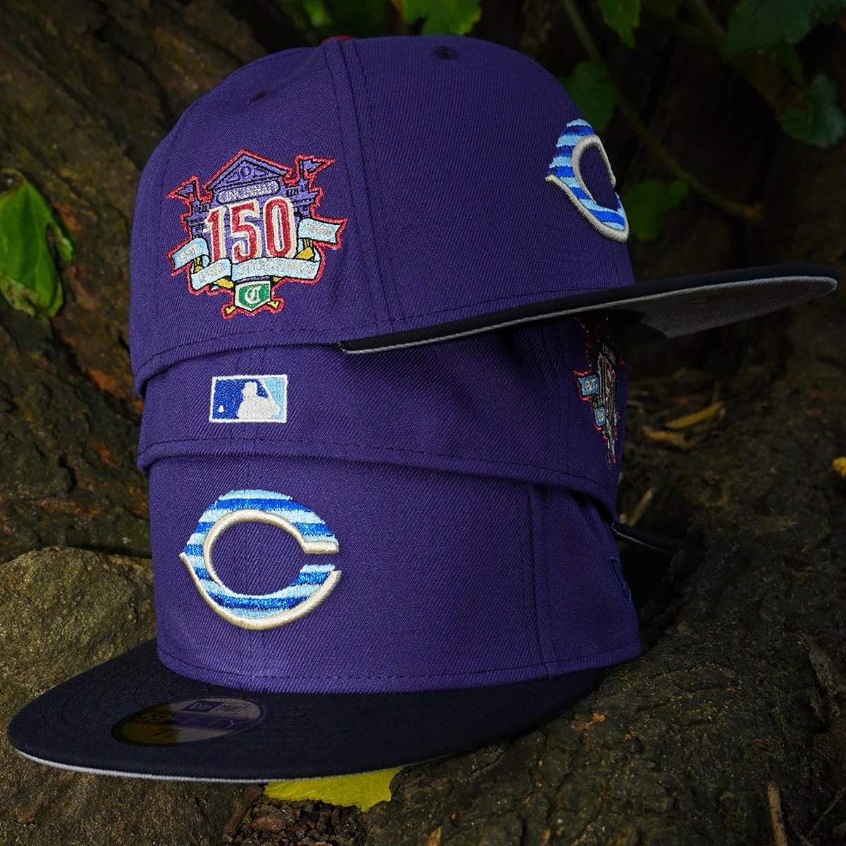 NEW ERA CINCINNATI REDS 59FIFTY 150TH ANNIV RED STOCKINGS PURPLE/NAVY